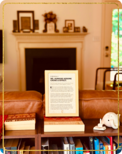 We, Humans book easel displayed in a living room