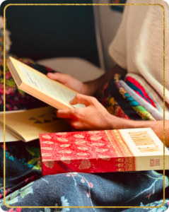 Someone browsing through the contents of We, Humans book